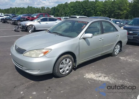 2003 Toyota Camry Le from USA, damaged, VIN 4T1BE32KX3U701132